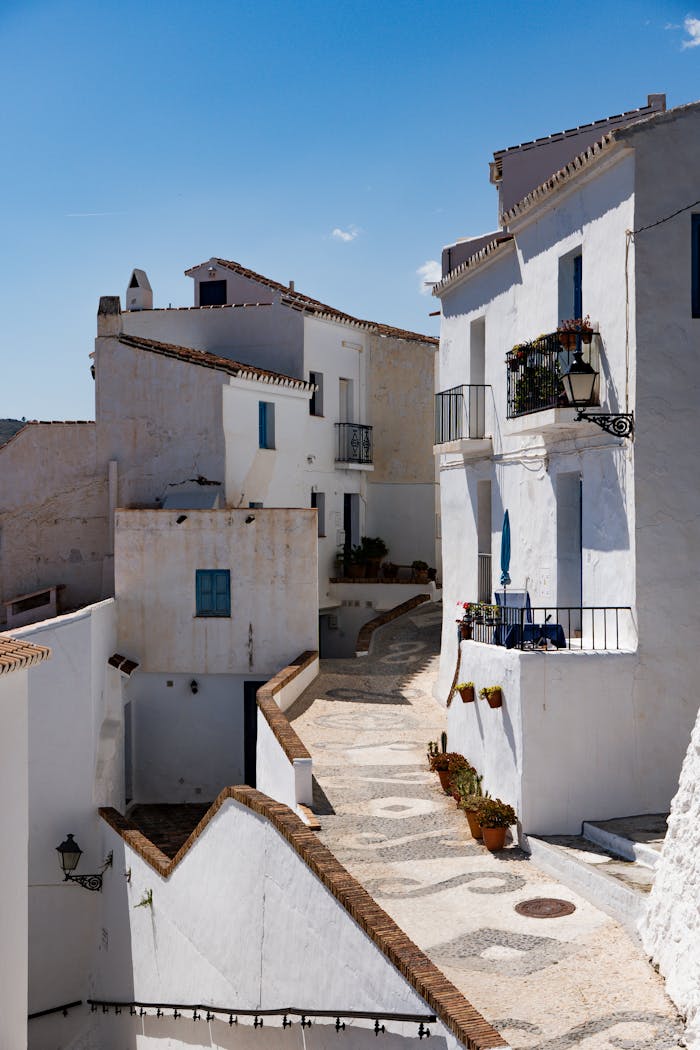 Discover the old-world charm of Frigilianas cobblestone streets in Andalusia, Spain.