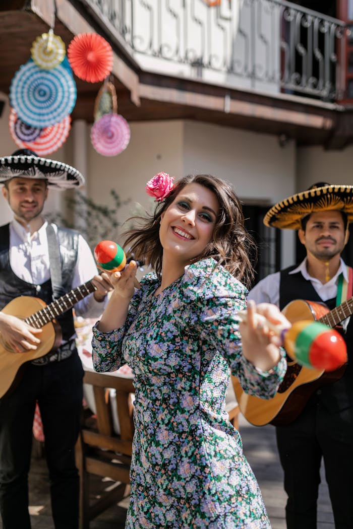 Mexican fiesta with musicians and dancers in traditional attire enjoying vibrant festivities.